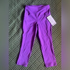 Size 6 Lululemon Swift Speed HR Crop 21’’ Leggings. New with Tags. Purple. Cute!